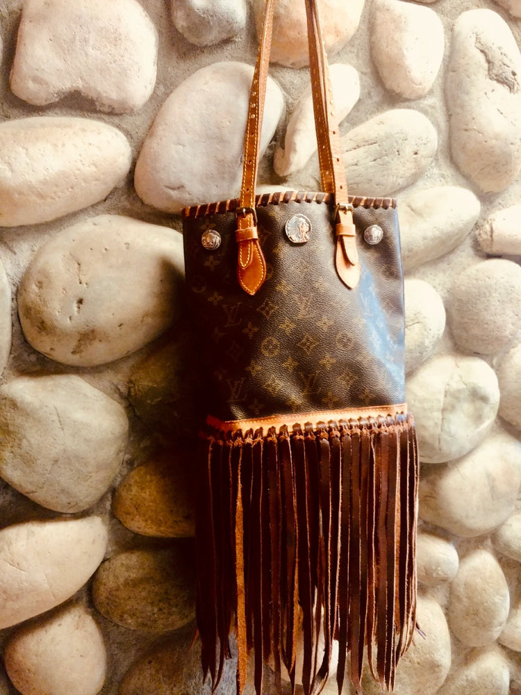 louis vuitton purse with tassels