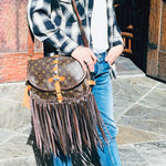 Buckled Buffalo Fringe Purse